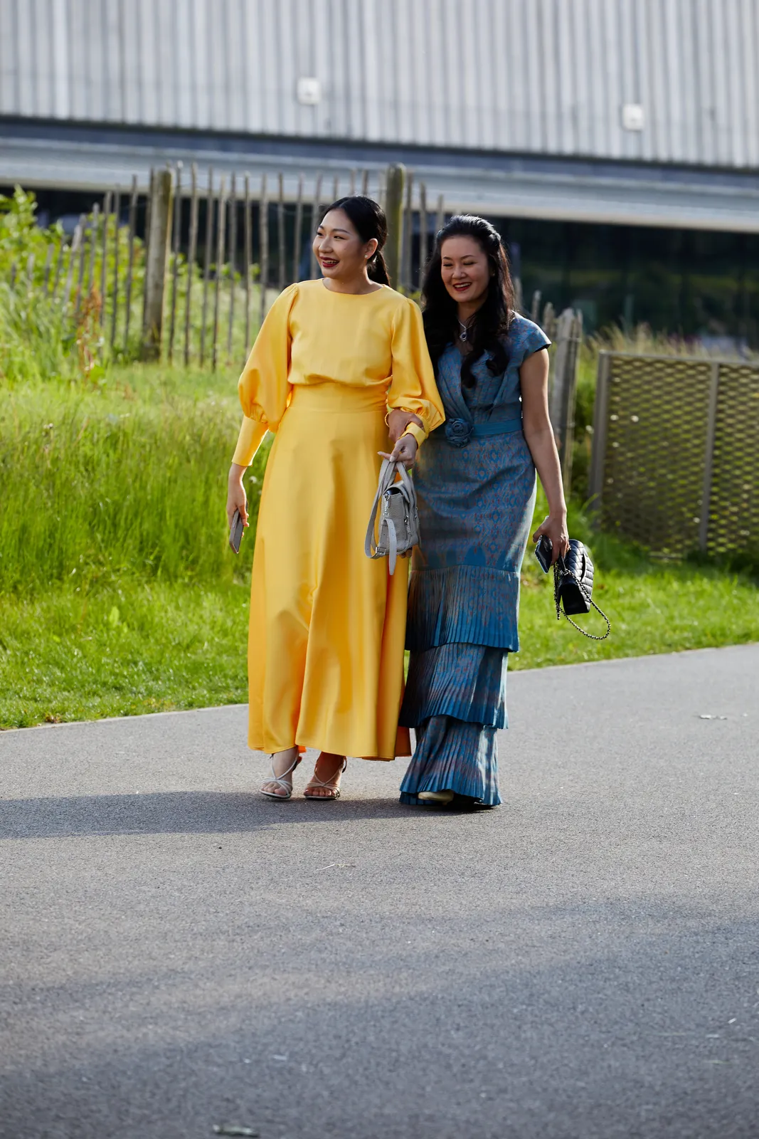 Guests in evening wear arriving at an event