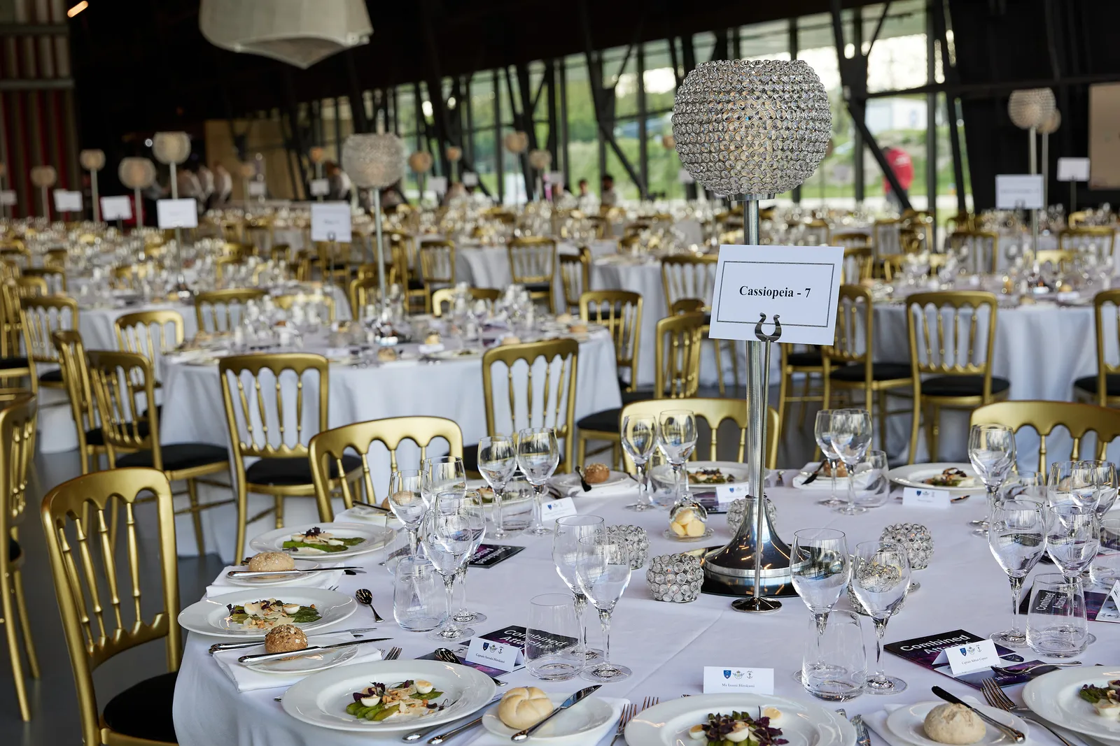 Elegantly set tables at an awards dinner