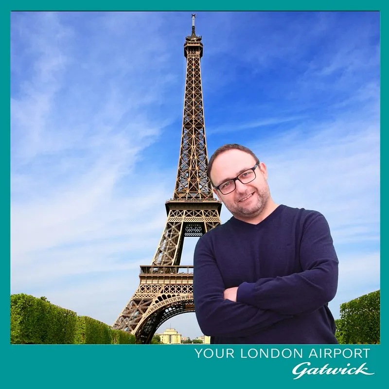 Gatwick-branded green screen composite with an Eiffel Tower backdrop at a London event
